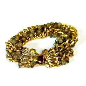 Vintage Lisner Multistrand Gold Tone Gray Rounded Bead Bracelet Fold Over Clasp